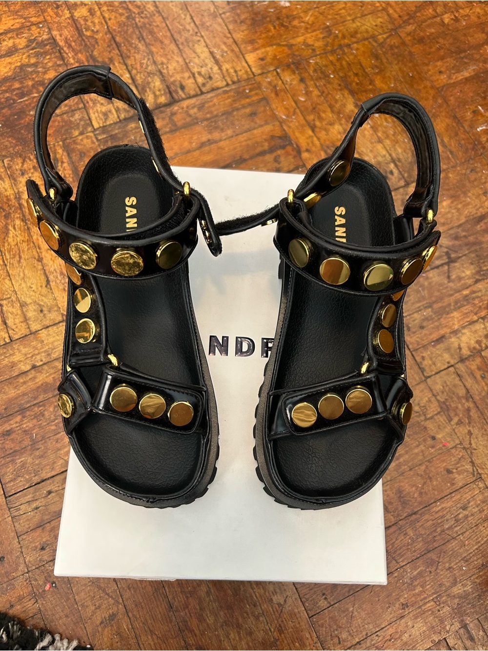 Sandro Black Leather Sandals with Gold Studs